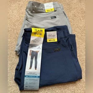2 pairs of Greg Norman pants brand new, one grey, one blue size 32 x 32.